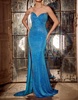 rhinestone ornate prom dress with slit in blue