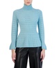 BCBGMAXAZRIA Women's Fitted Peplum Sweater Long Sleeve Bell Cuff Turtle Neck Ruffle Hem Top