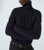 Cable-knit wool turtleneck sweater