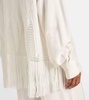 Open-knit fringed shirt