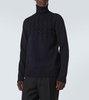 Cable-knit wool turtleneck sweater