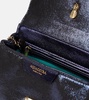 Twist Mini leather-trimmed clutch
