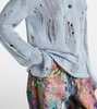 Distressed cotton and wool sweater