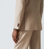 Double-breasted wool, linen, and silk suit