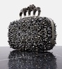 Knuckle embellished leather clutch