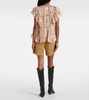Madrana printed ruffled cotton blouse