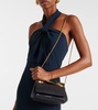 Twist Mini leather-trimmed clutch
