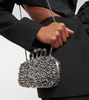 Knuckle embellished leather clutch