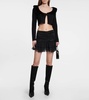 Ruffle-trimmed pleated miniskirt