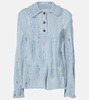 Distressed cotton and wool sweater