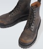 Strike leather boots
