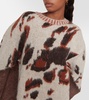 Caped jacquard sweater