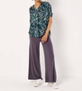 abstract print pleat top in green